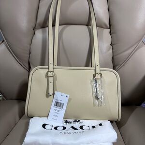 Coach swing zip light yellow Leather Shoulder Bag